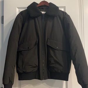 A pre- owned Zara’s Men black bomber jacket.